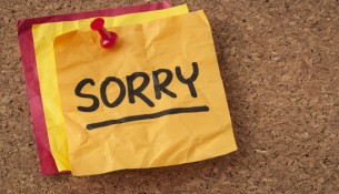 sorry - apology on sticky note