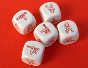 Erotic dices on red background