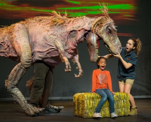 Aimee Louisanne with T-Rex and friend from DINOSAUR ZOO LIVE.  Photo C. Waits
